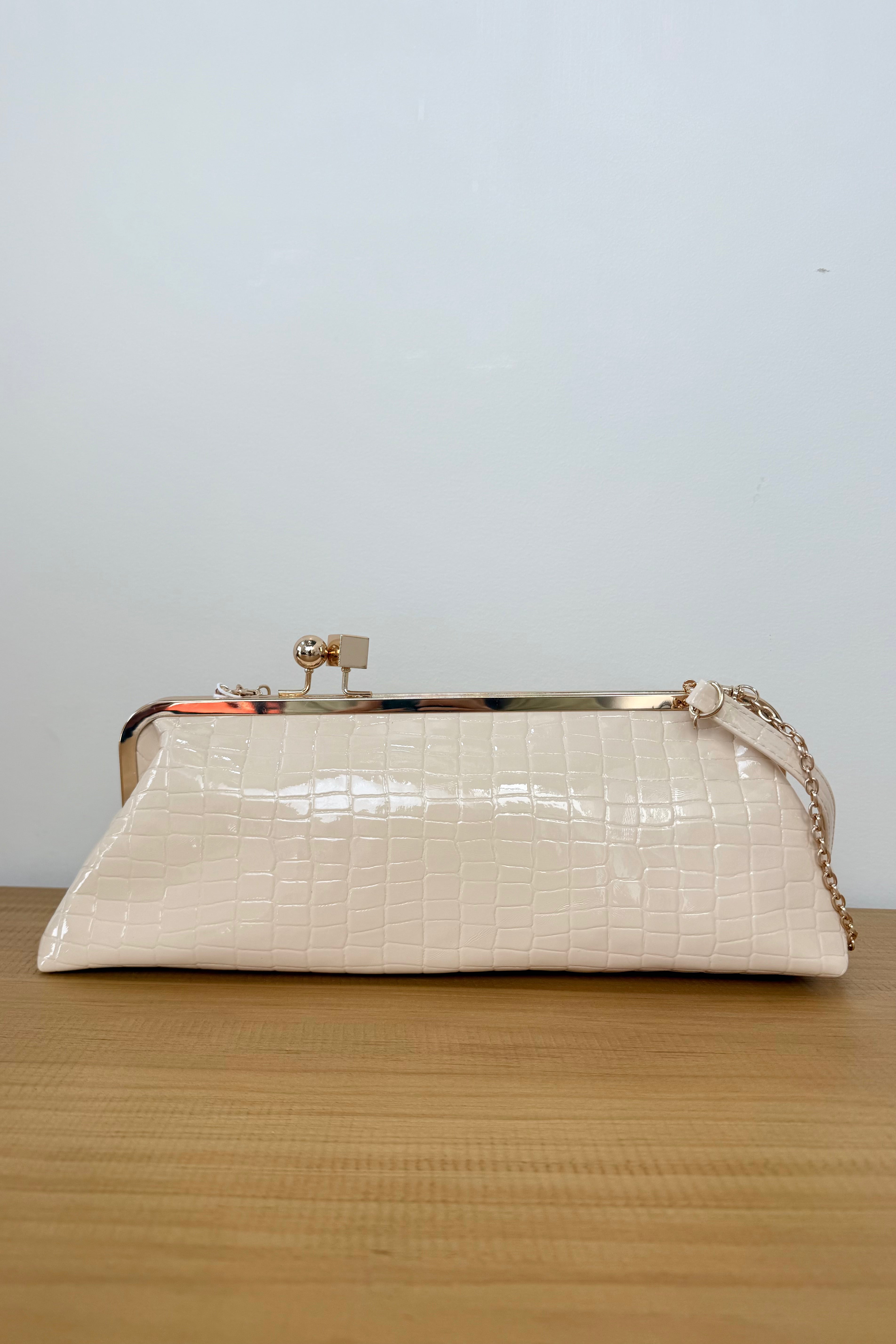 cream croc texture clutch bag with gold detachable straps