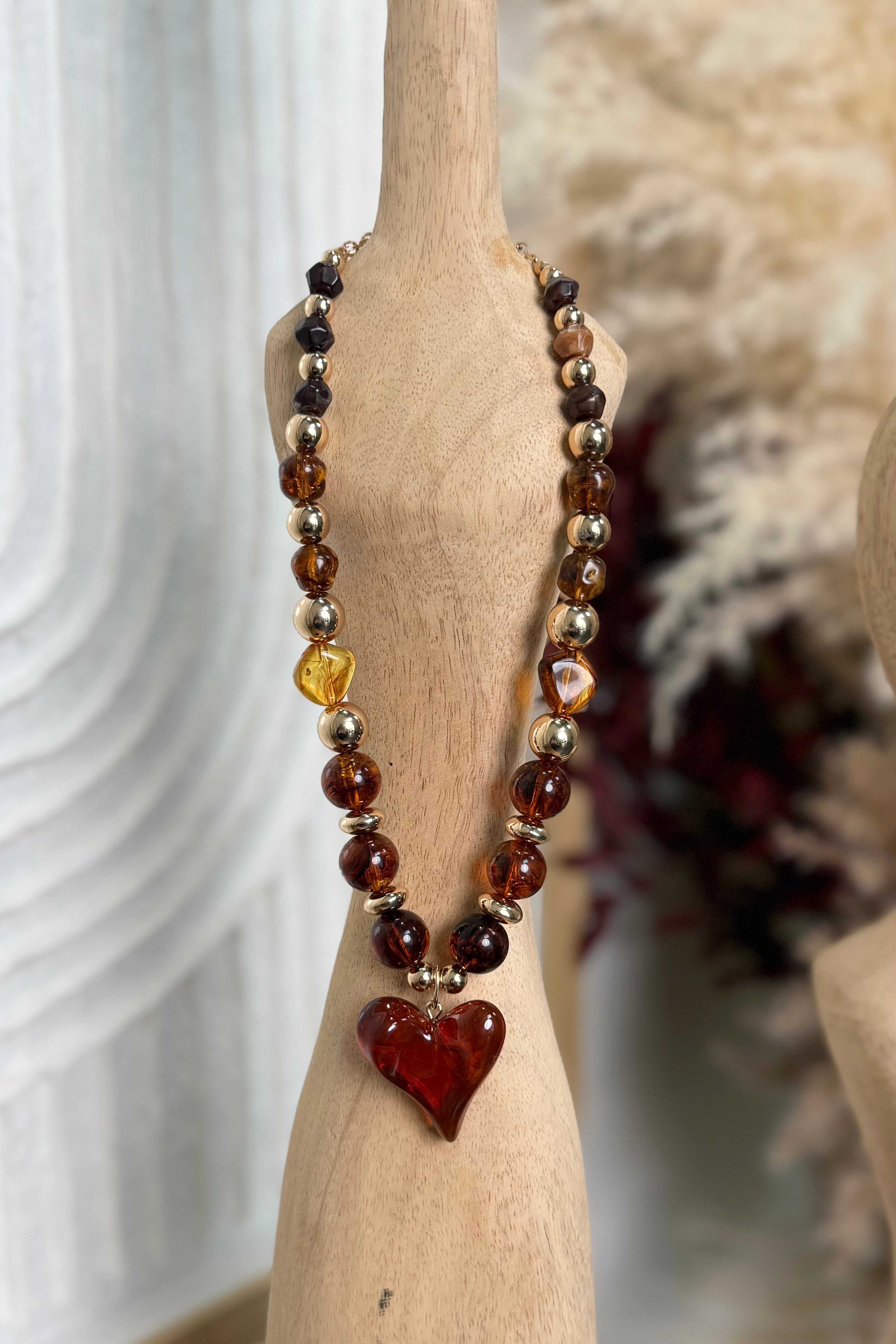 beaded necklace with heart pendant