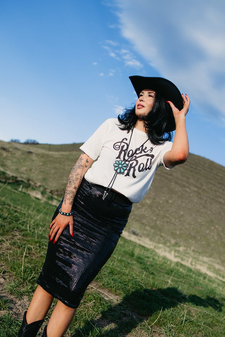 sequin midi skirt, black shimmering skirt, holiday party outfit, concert attire for women, stretch waist sparkle skirt, western chic fashion, evening midi skirt, body-skimming sequin skirt