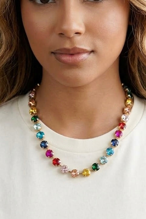 Multicolor glass crystal necklace featuring round faceted jewel-tone crystals in a gold-tone cup chain setting.
