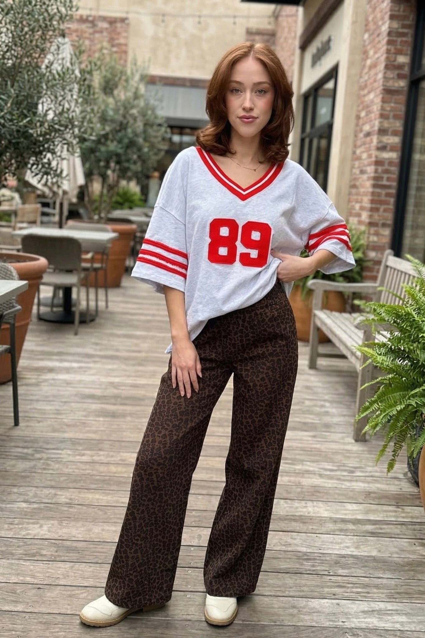 Leopard print pants, high waisted flares, wide leg animal print trousers, women's statement pants, leopard denim, concert outfit ideas, boutique streetwear.