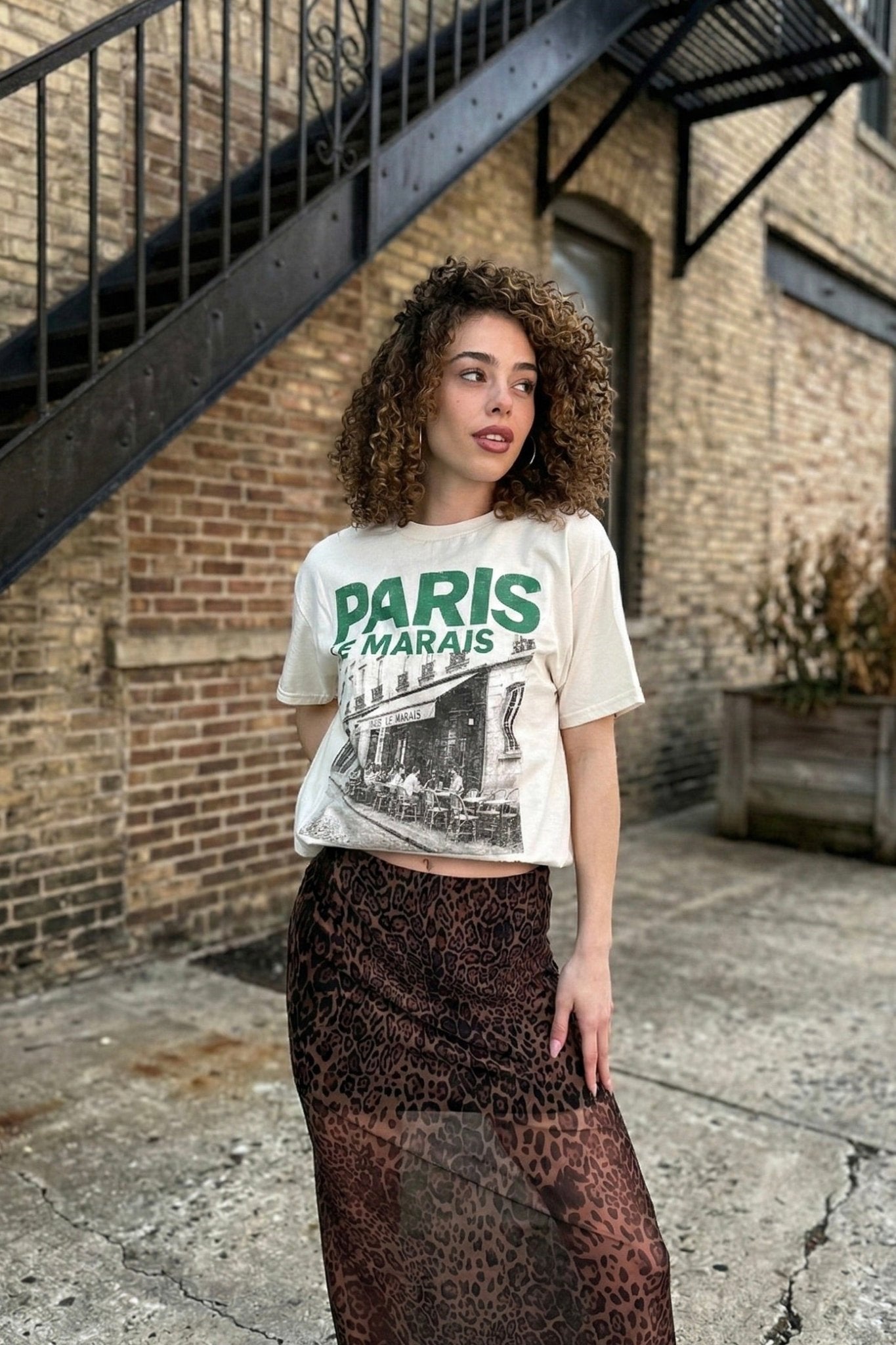 Women’s Paris Le Marais graphic tee with vintage café print and relaxed fit cream t-shirt