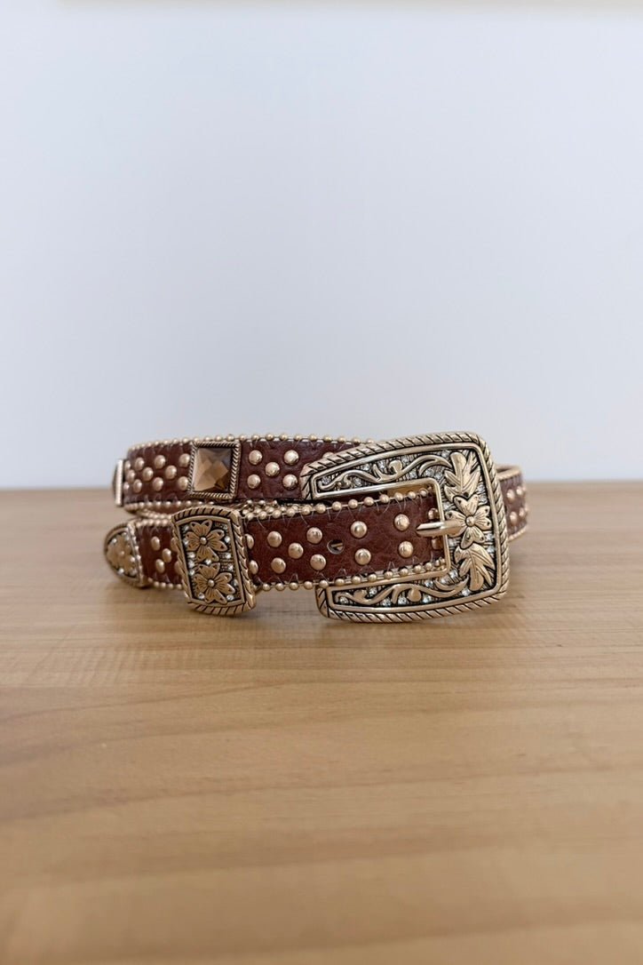 Western studded belt with detailed buckle in two colors