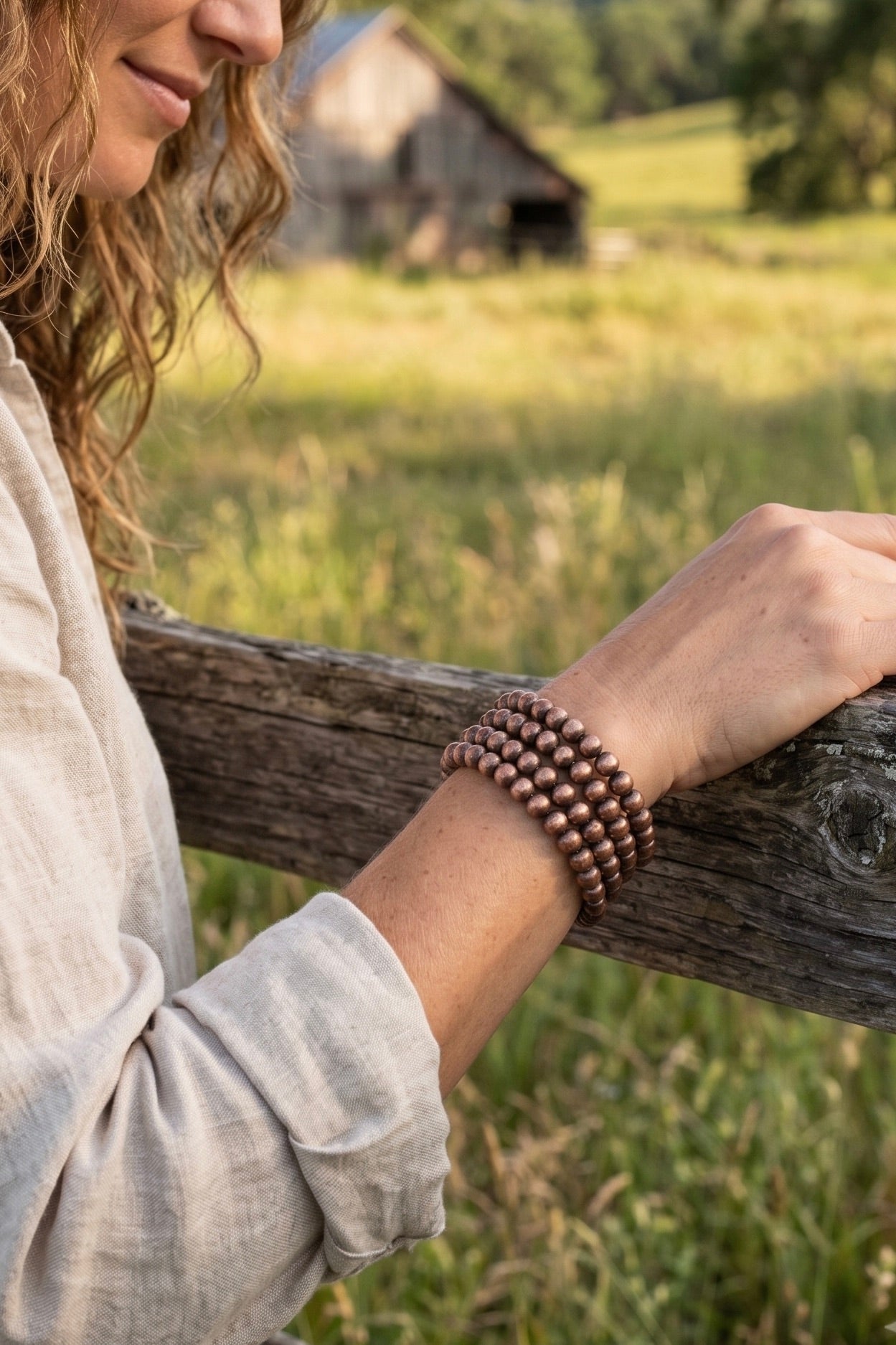 Copper beaded stretch bracelet stack featuring layered Navajo-inspired metallic beads, perfect for western outfits, rodeo style, country concerts, and everyday boutique jewelry.
