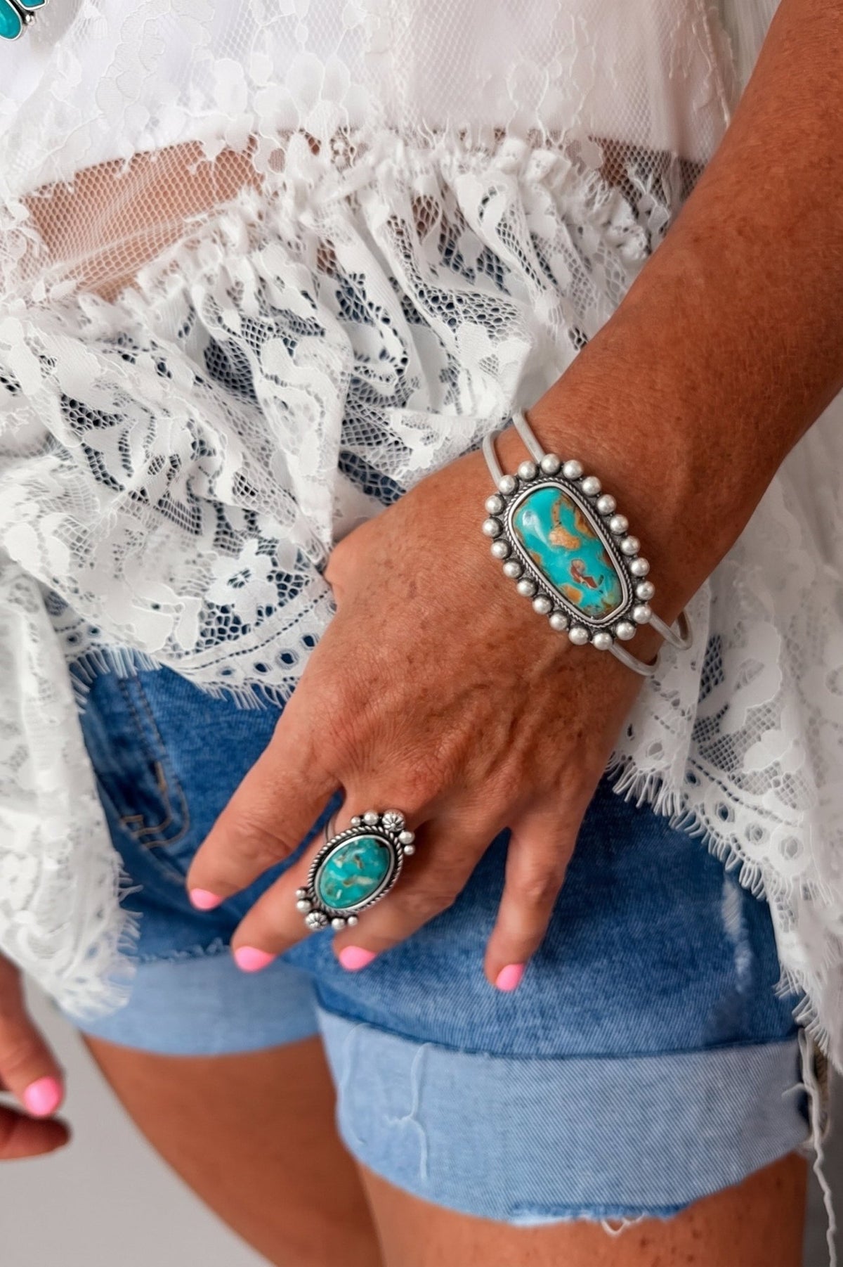 Southwestern multi color stone cuff bracelet with antique silver accents and classic western styling, ideal for country concert outfits, rodeo fashion, Nashville looks, and boutique western jewelry collections.