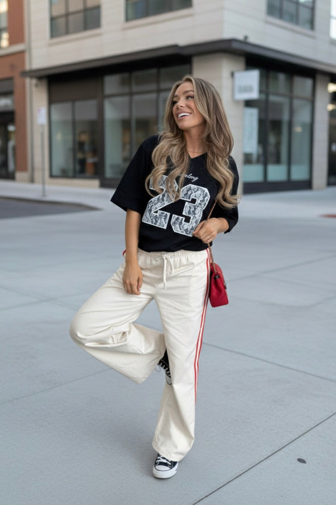 Womens lace graphic detail jersey top