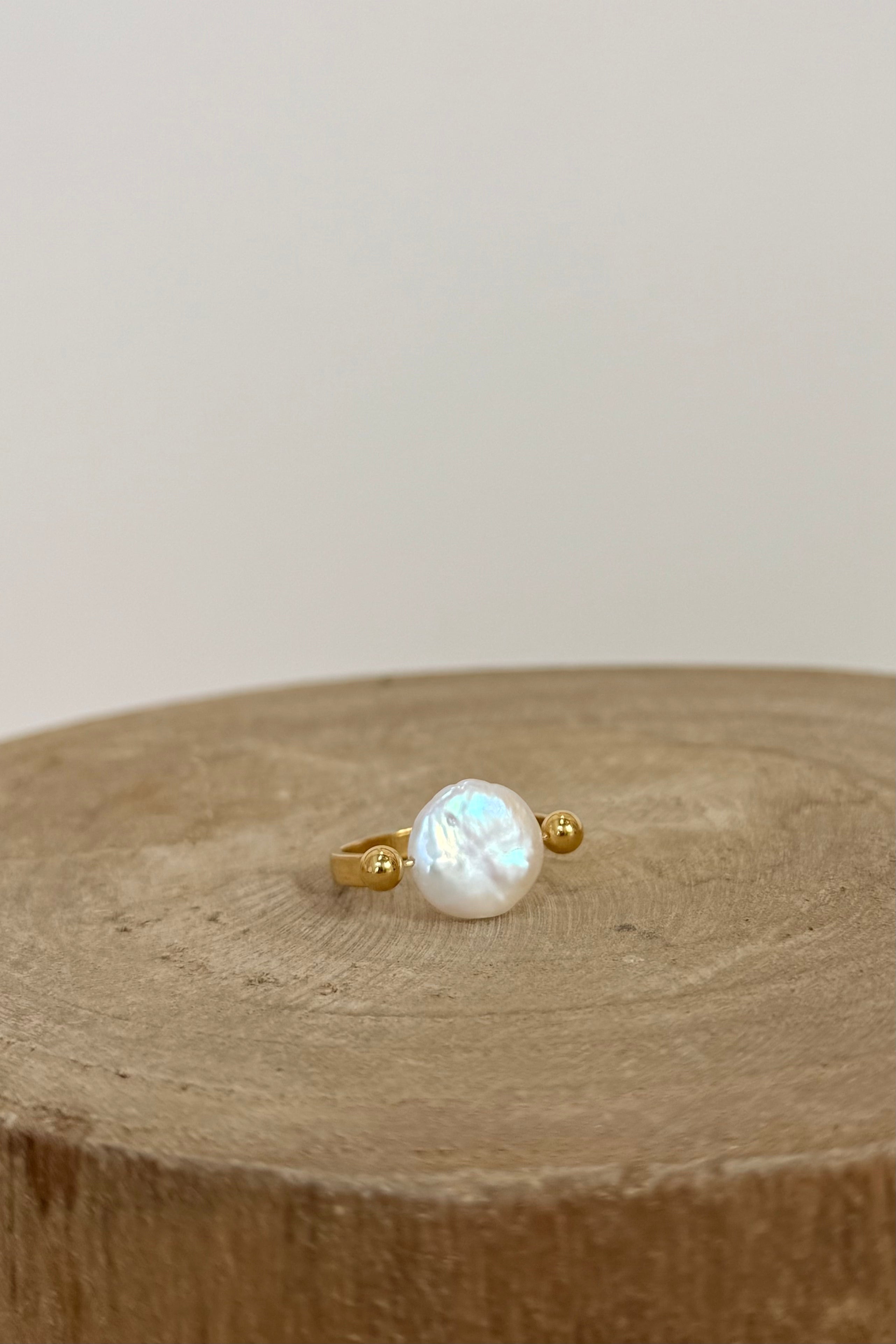 Pearl statement ring with gold band