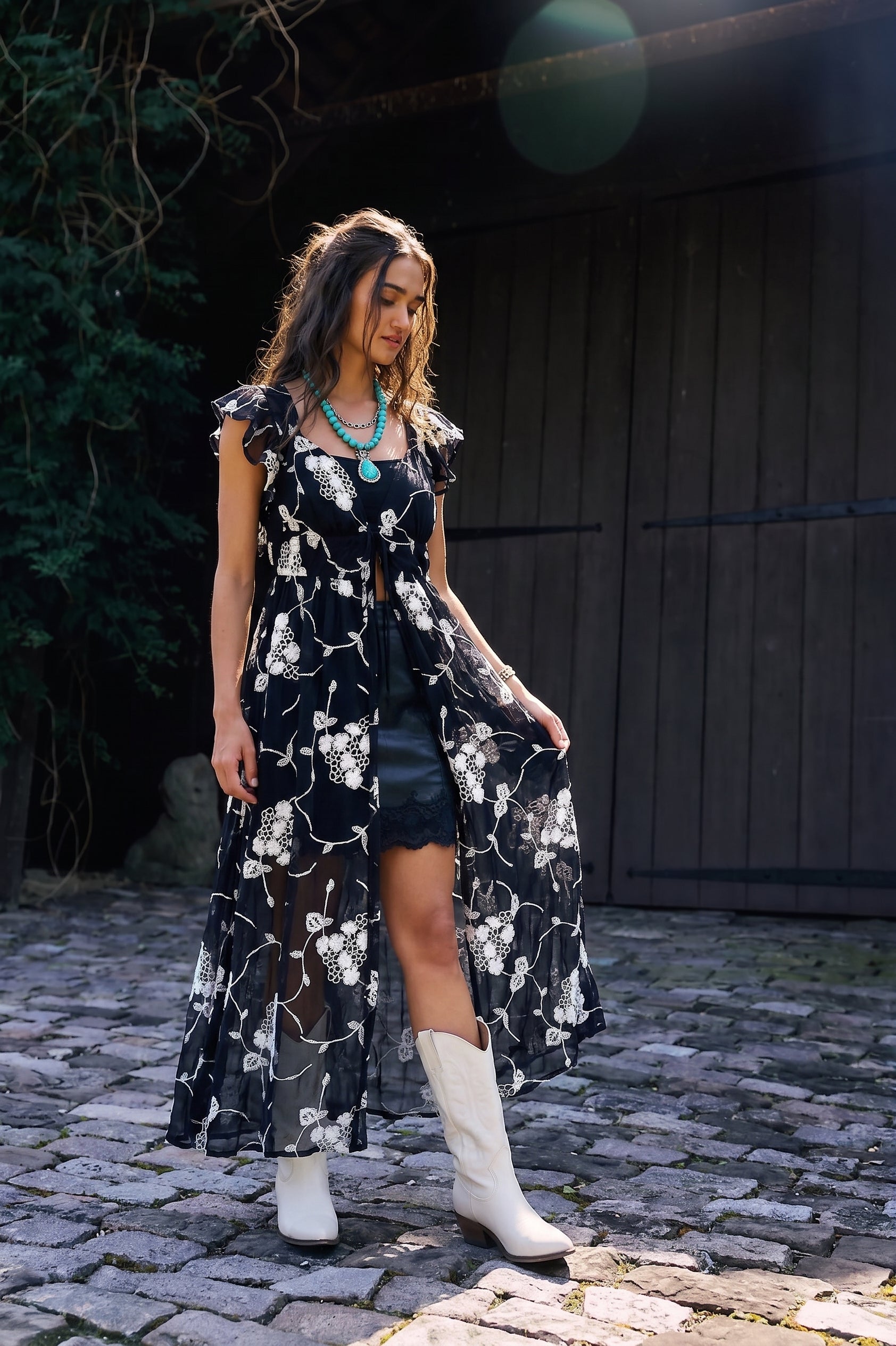 Embroidered front tie sheer duster in black. This will elevate any outfit