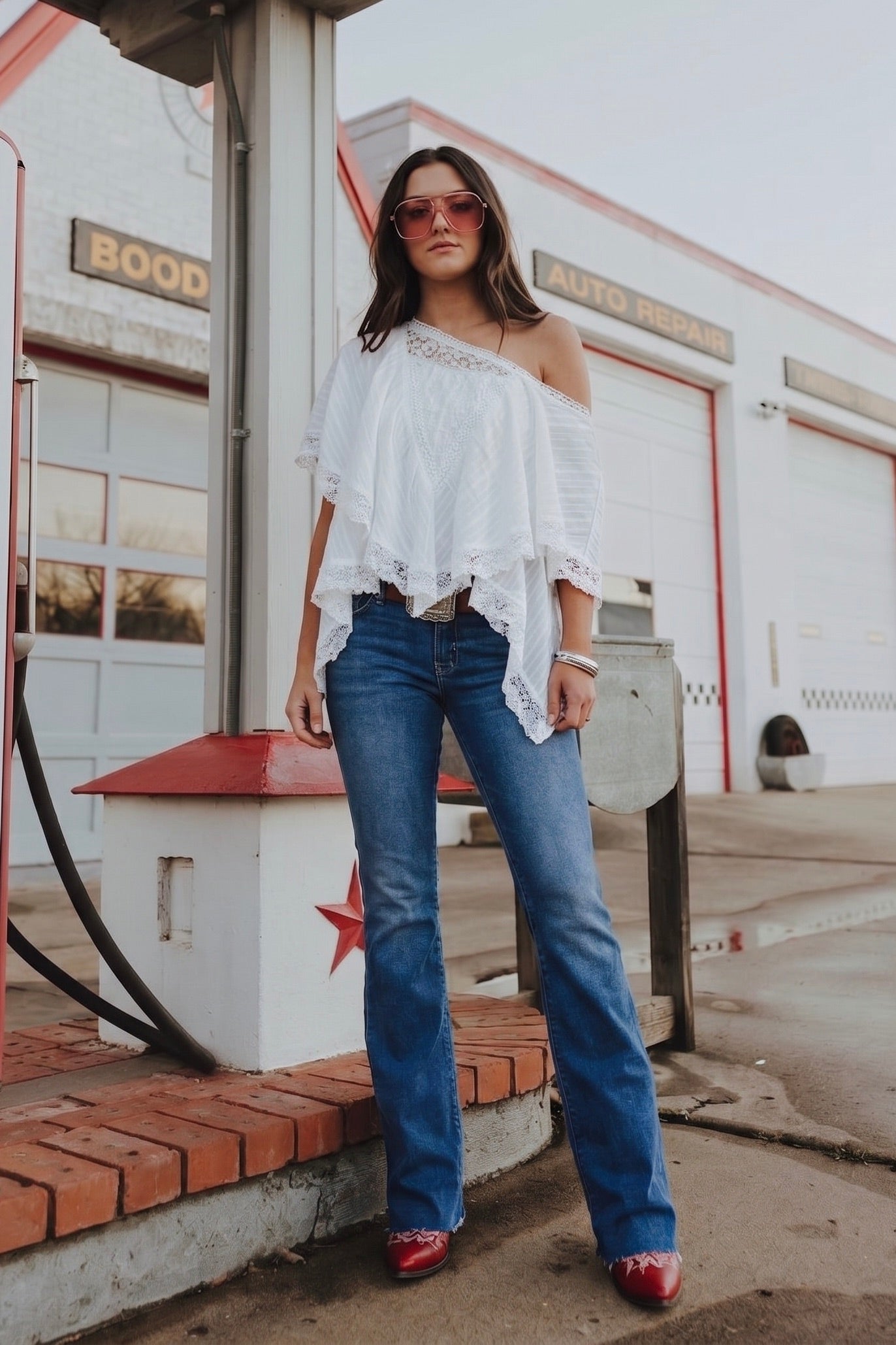 Poncho style flutter sleeve blouse with lace detailing. Perfect for a little off the shoulder sass. wear with jeans, or dress it up with a skirt