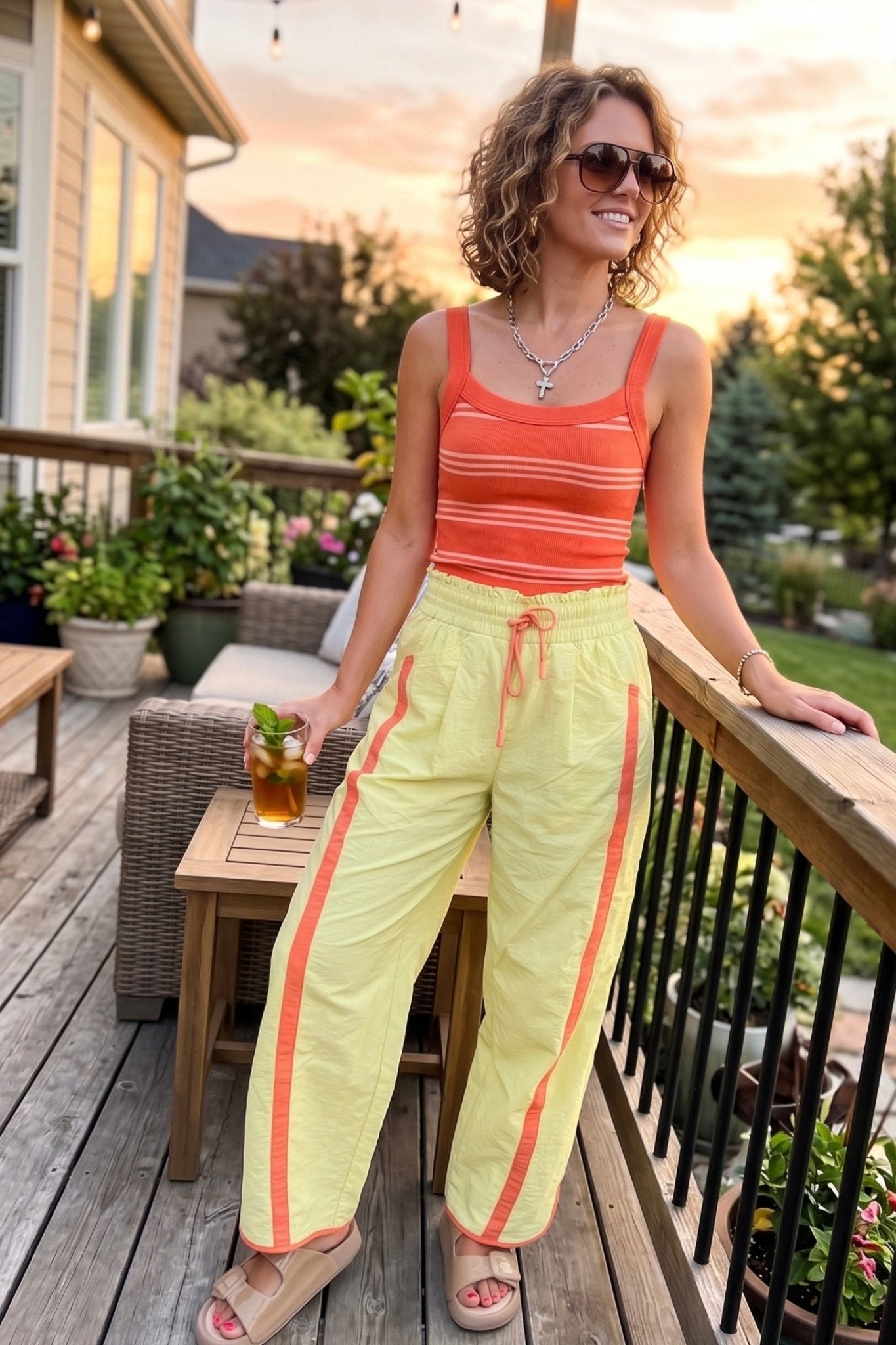 Women's lightweight wide leg summer pants featuring a relaxed fit, elastic drawstring waist, and coral contrast stripe details. Perfect for vacation outfits, resort wear, beach trips, summer travel, and colorful boutique fashion.