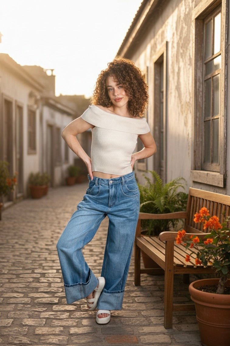 high-rise cuffed jeans, wide leg denim, oversized cuff jeans, women's structured denim, medium wash wide leg, editorial denim style, polished casual jeans