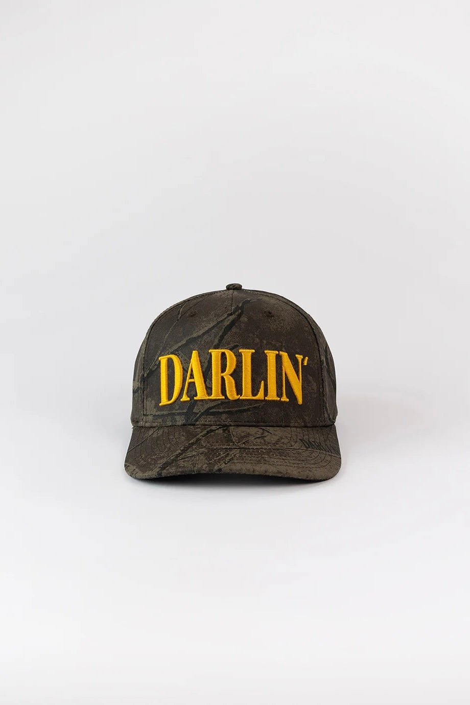 camo snapback hat with yellow "darlin" writing