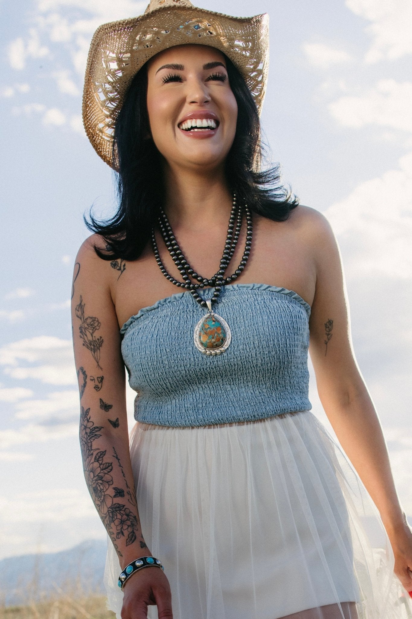 Bold turquoise pendant necklace with triple strand black beads and vintage silver frame