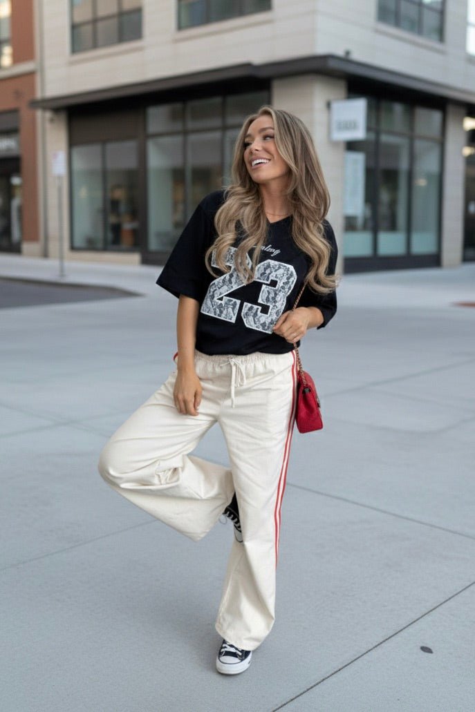 Womens lace graphic detail jersey top