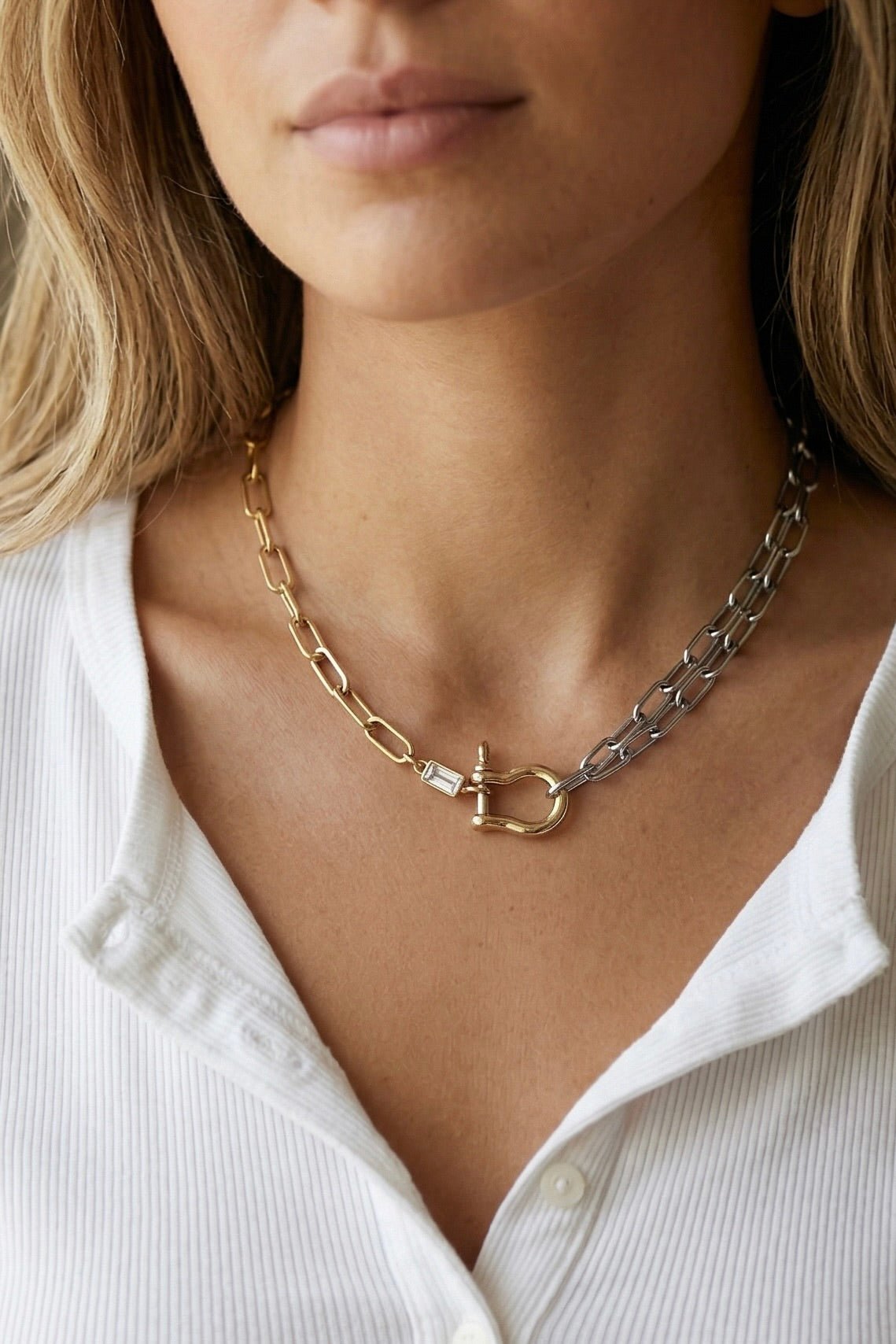 Chunky two-tone chain necklace with gold toggle clasp and silver link detail