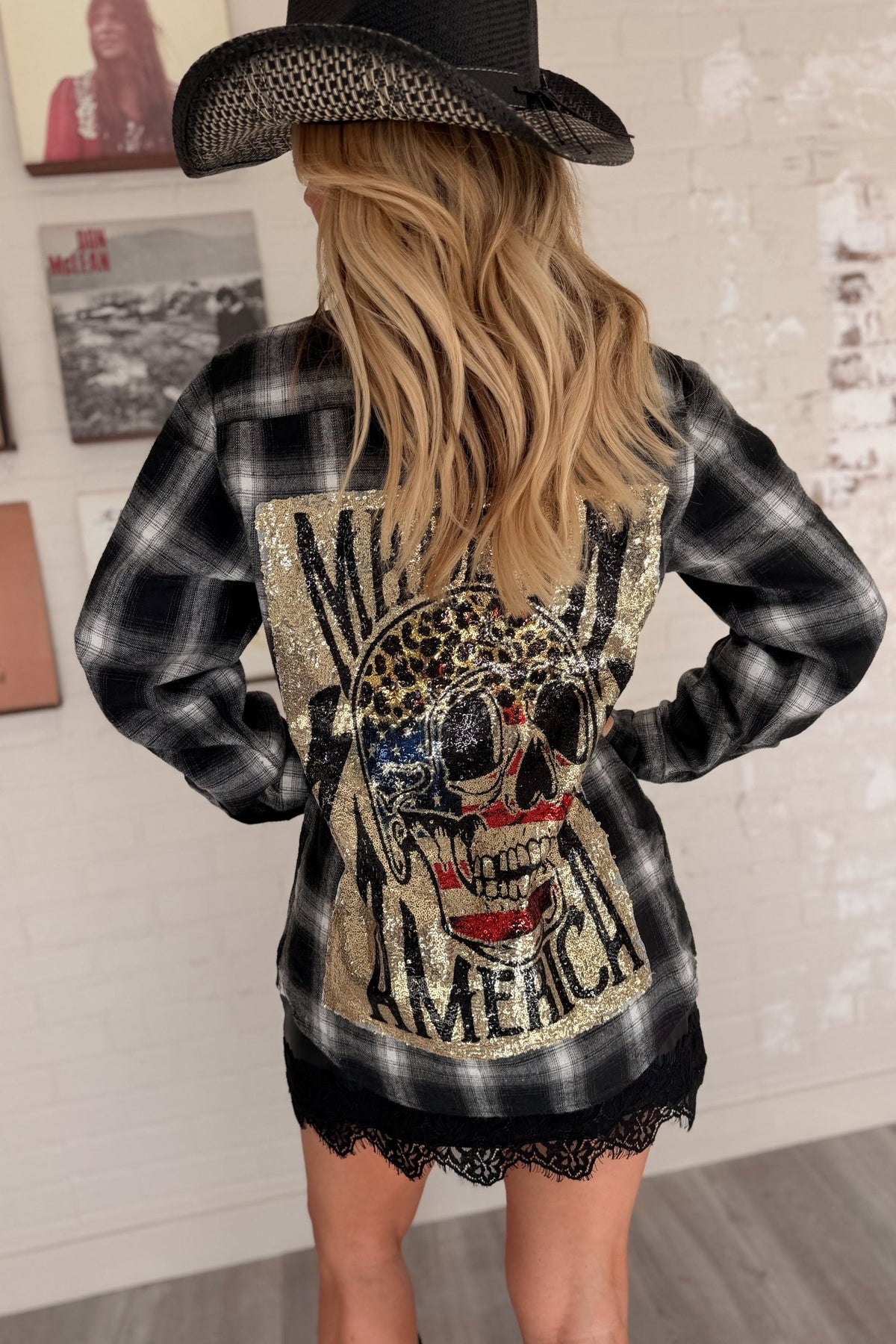 Women’s red, black and cream plaid flannel button-down shirt featuring a relaxed oversized fit, collared neckline, long sleeves, button front closure and dual chest flap pockets. Classic tartan plaid shirt styled as an easy layering piece for casual, grunge-inspired and fall outfits.
