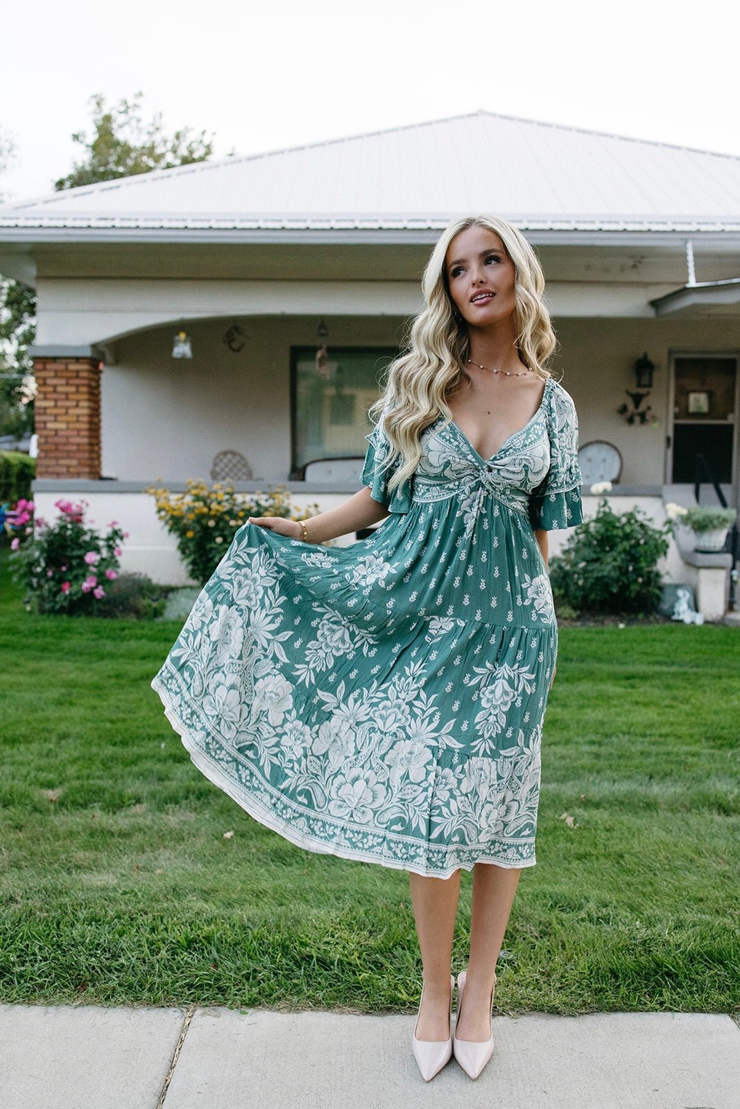 floral print midi dress with Chris cross neckline 