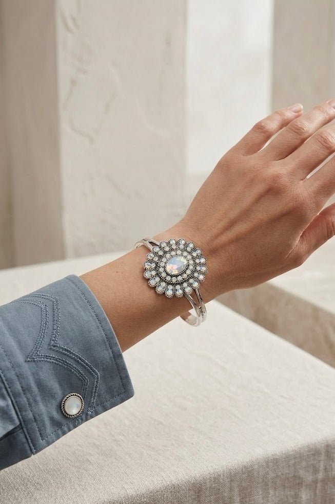 Western silver cuff bracelet with iridescent stone detail styled for country concert outfits, boho cowgirl fashion, rodeo style and western festival looks from Sand + Charcoal Boutique