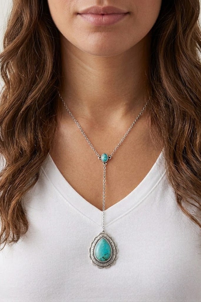Western turquoise Y-necklace with antique silver pendant, boho cowgirl statement jewelry, layered western necklace for country concert outfits and boutique styling